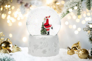 Medium Skating Santa Snow Globe with Music